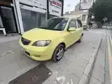 Mazda Demio 2003 photo 4