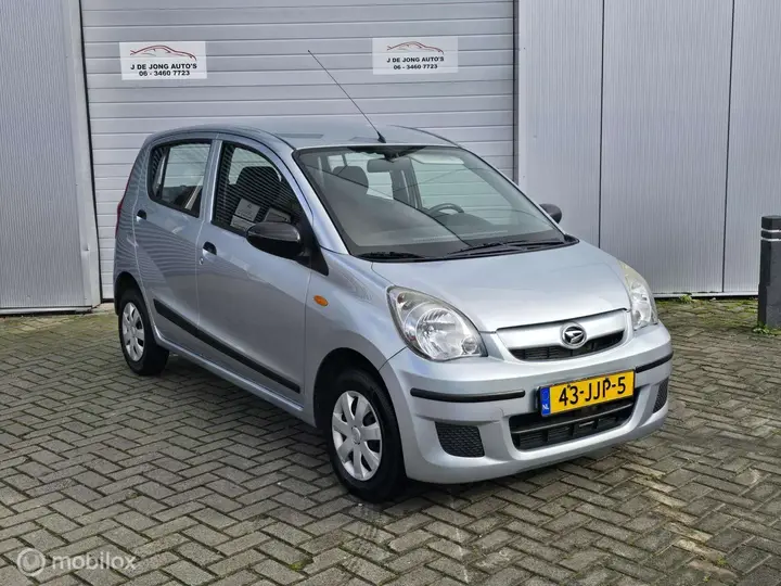 Daihatsu Cuore 2009 photo 4