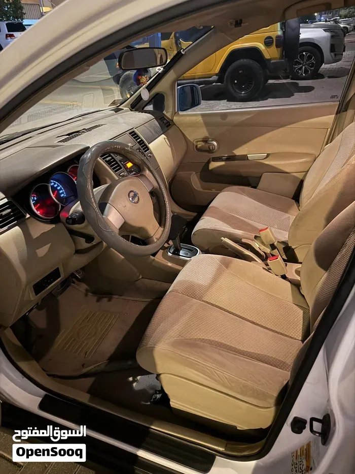 Nissan Tiida 2013 photo 3