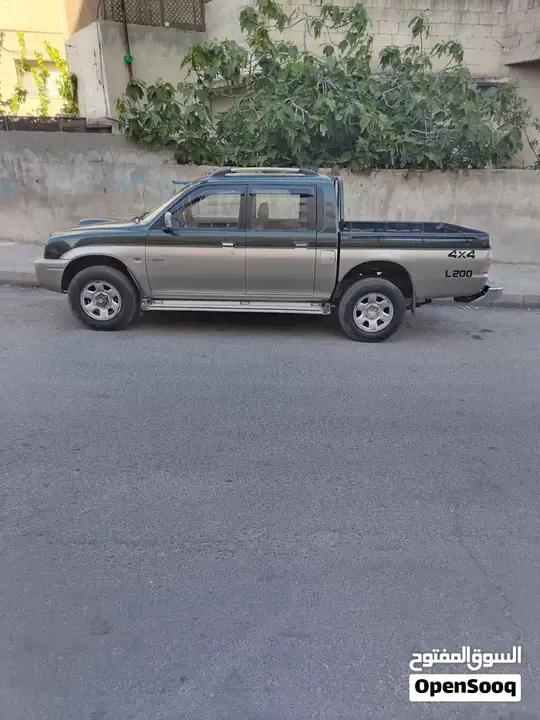 Mitsubishi L200 2006 photo 2