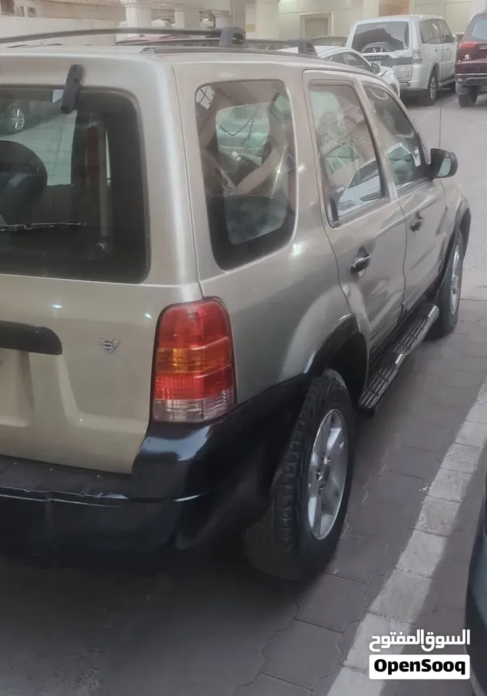 Ford Escape 2005 photo 3