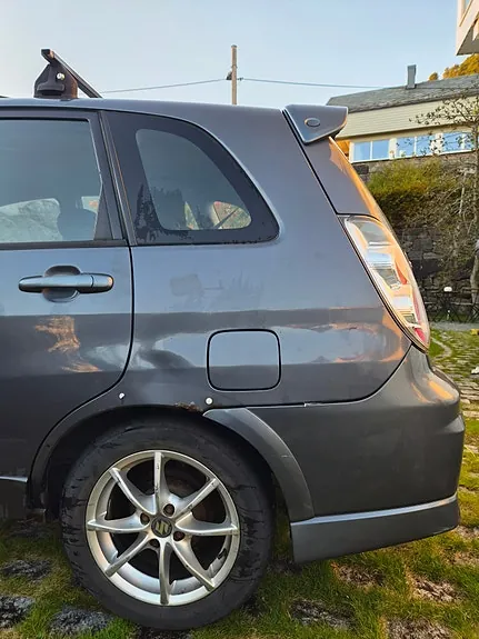 Suzuki Liana 2006 photo 4