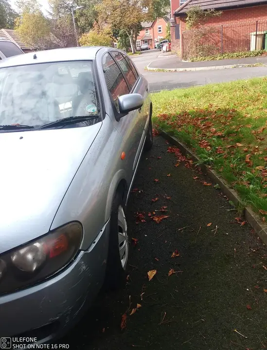 Nissan Almera 2004 photo 5