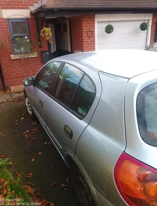 Nissan Almera 2004 photo 4