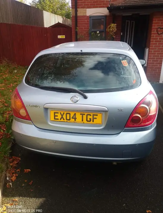Nissan Almera 2004 photo 3
