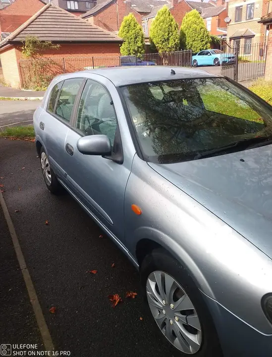 Nissan Almera 2004 photo 2