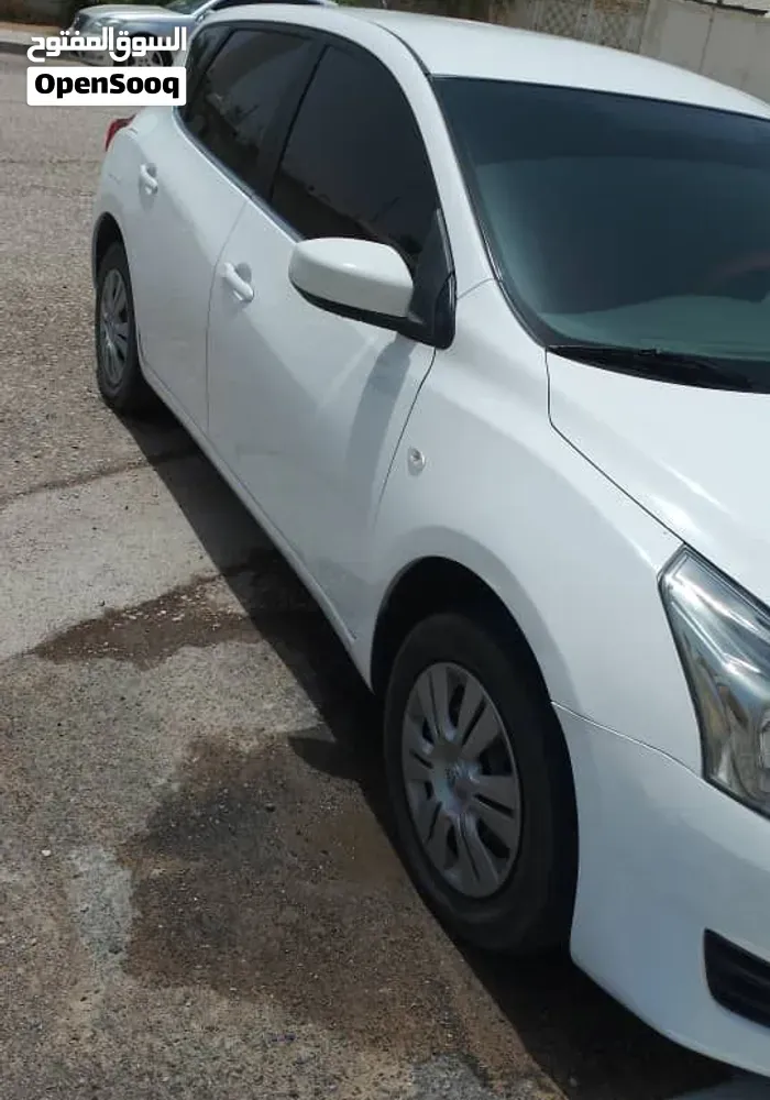Nissan Tiida 2014 photo 3