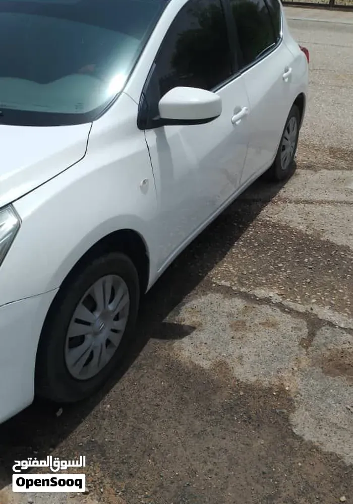 Nissan Tiida 2014 photo 4