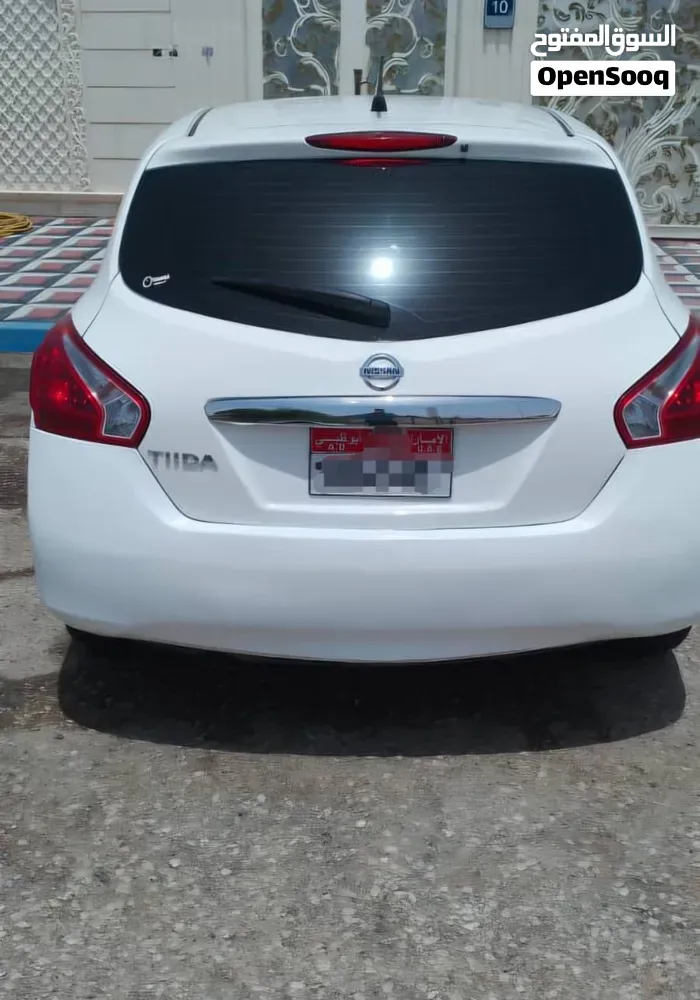 Nissan Tiida 2014 photo 2