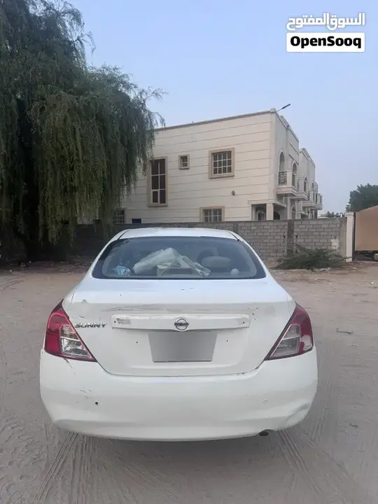 Nissan Sunny 2012 photo 4
