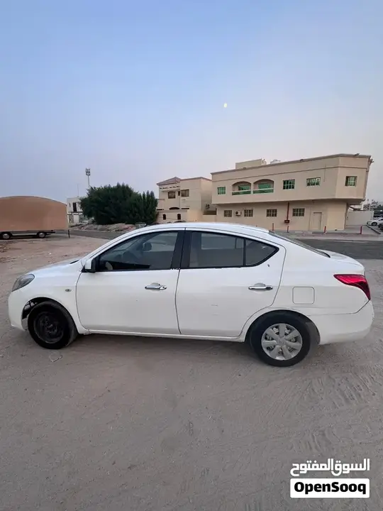 Nissan Sunny 2012 photo 2