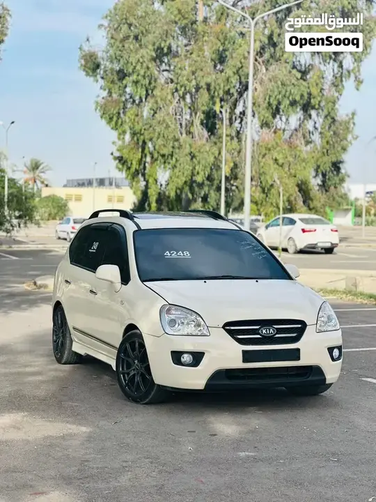 Kia Carens 2009 photo 2