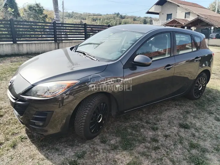 Mazda 3 2011 photo 2