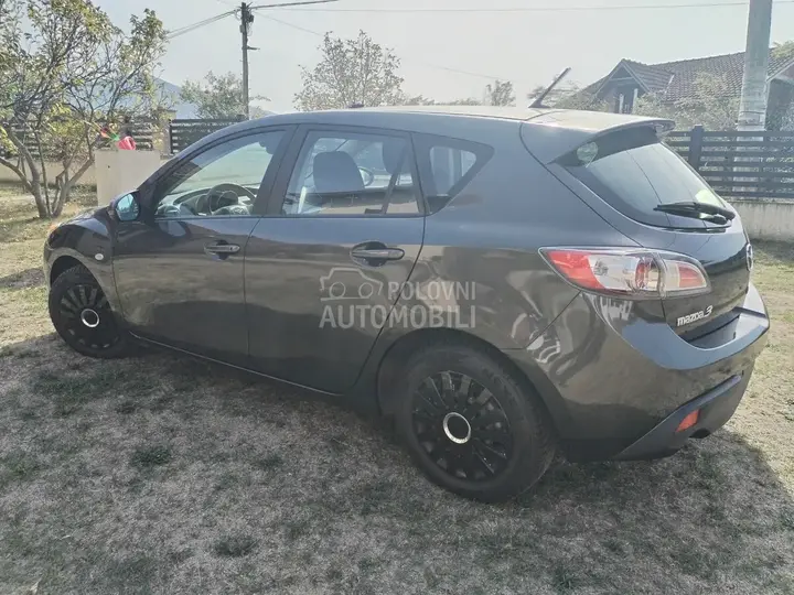 Mazda 3 2011 photo 4