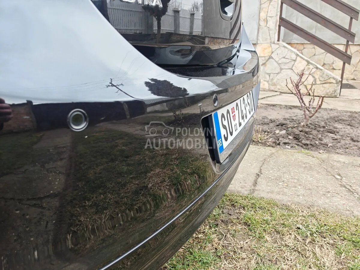 Opel Astra J 2010 photo 4