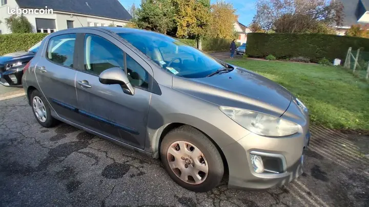 Peugeot 308 2011 photo 2