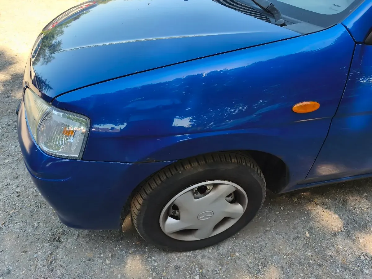 Mazda Demio 2002 photo 2