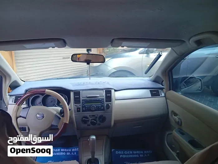 Nissan Tiida 2012 photo 4