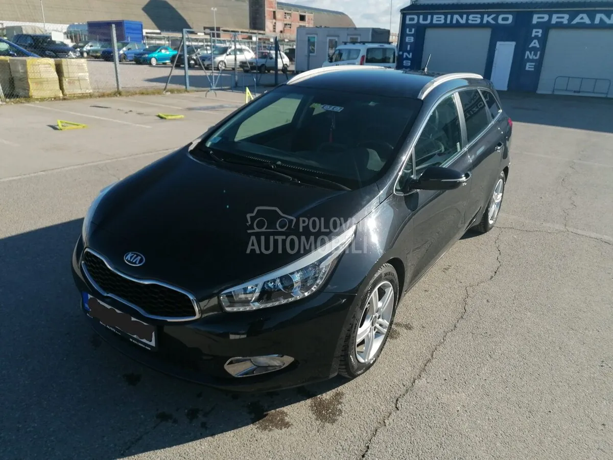 Kia Ceed Sw 2014 photo 2