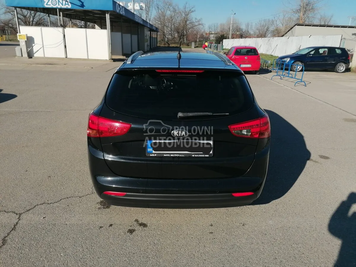 Kia Ceed Sw 2014 photo 4