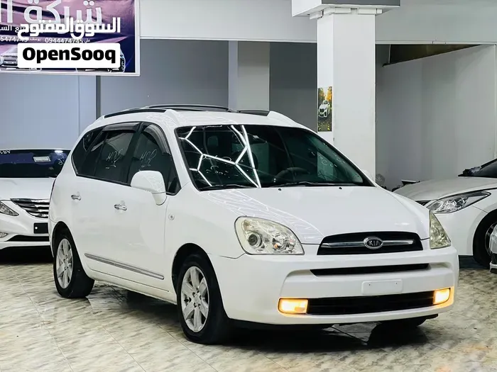 Kia Carens 2009 photo 2