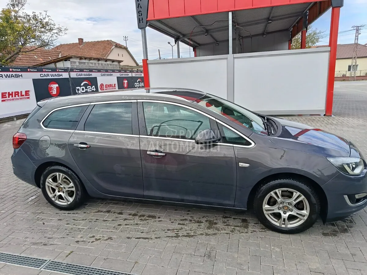 Opel Astra J 2013 photo 4