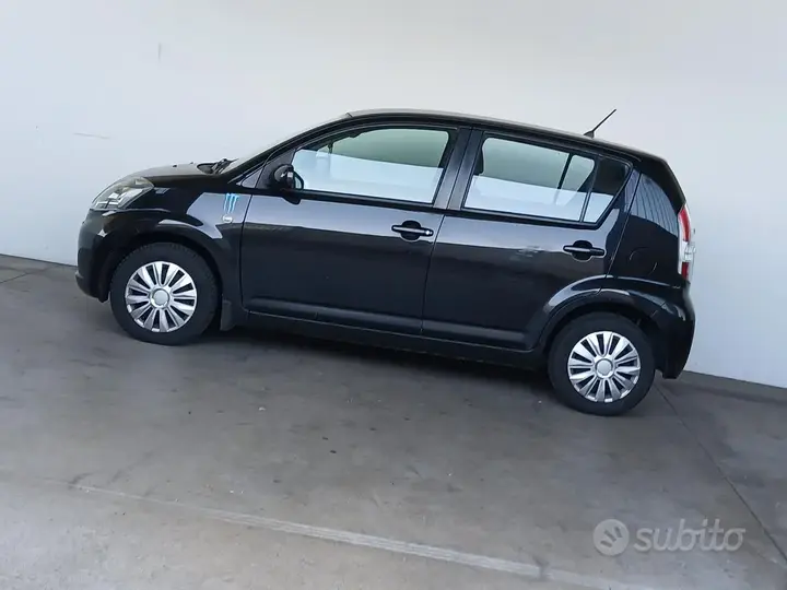 Daihatsu Sirion 2006 photo 4