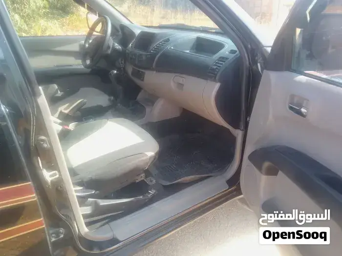 Mitsubishi L200 2010 photo 3