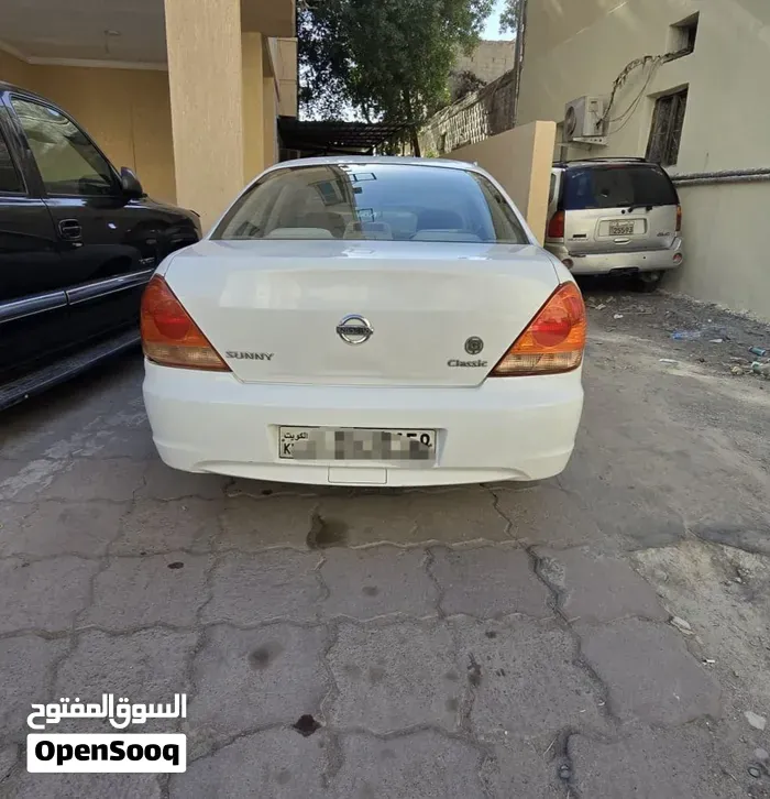 Nissan Sunny 2012 photo 2