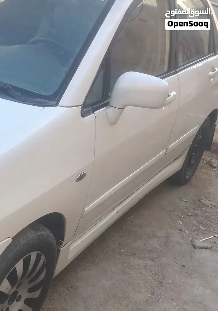 Suzuki Liana 2005 photo 2