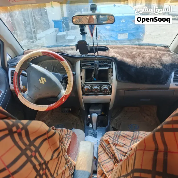 Suzuki Liana 2005 photo 5