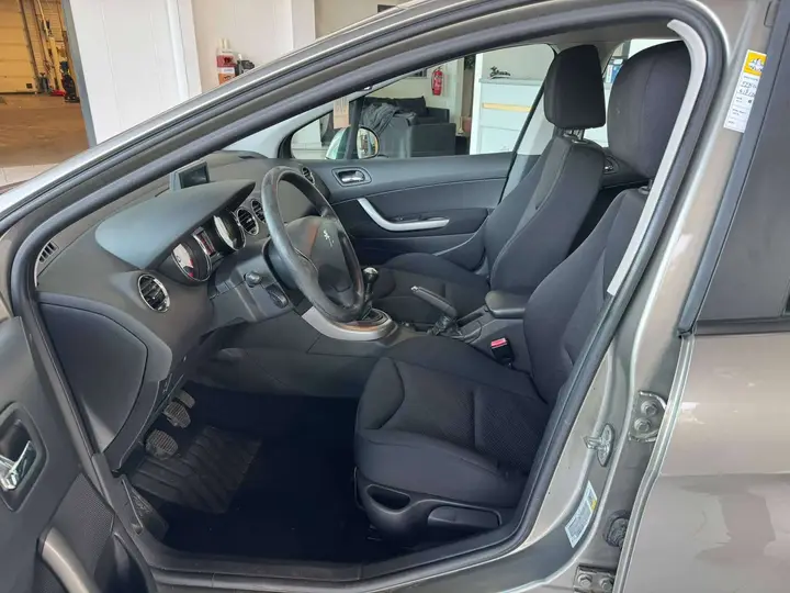 Peugeot 308 2013 photo 5