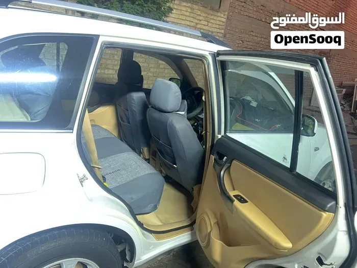 Chery Tiggo 2013 photo 4