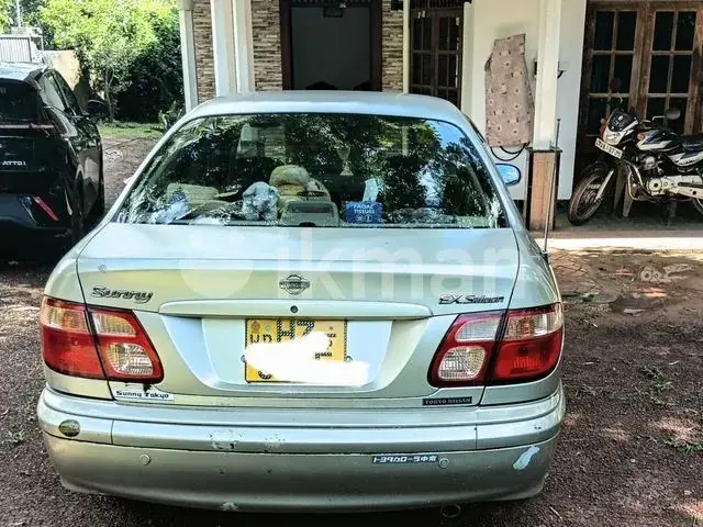 Nissan Sunny 2004 photo 4