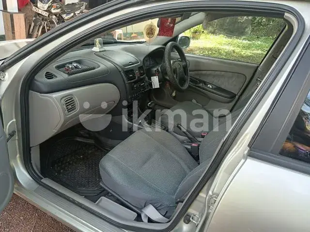 Nissan Sunny 2004 photo 3