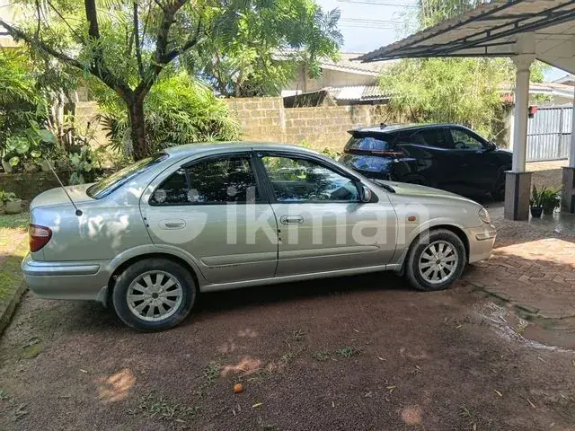 Nissan Sunny 2004 photo 2