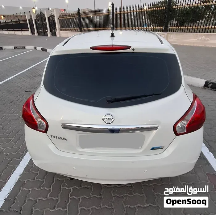 Nissan Tiida 2014 photo 2