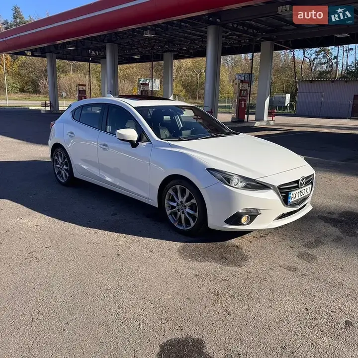 Mazda 3 2014 photo 2