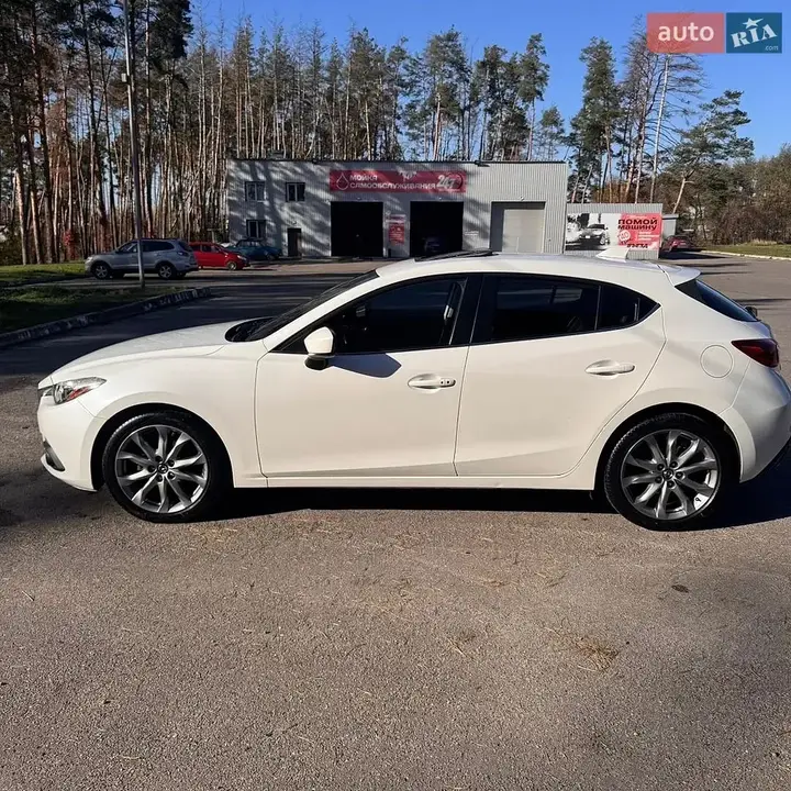 Mazda 3 2014 photo 4