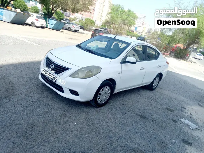 Nissan Sunny 2012 photo 4