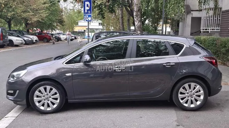 Opel Astra J 2013 photo 4