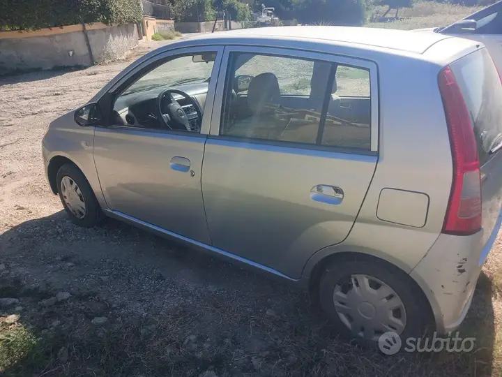 Daihatsu Cuore 2007 photo 4