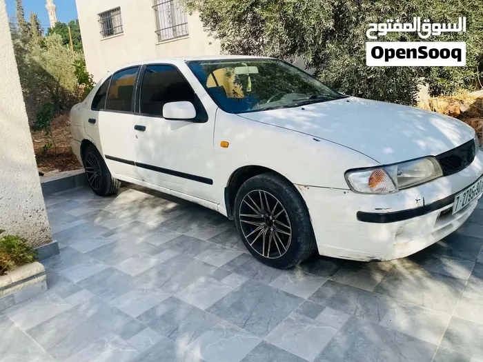 Nissan Almera 1999 photo 2