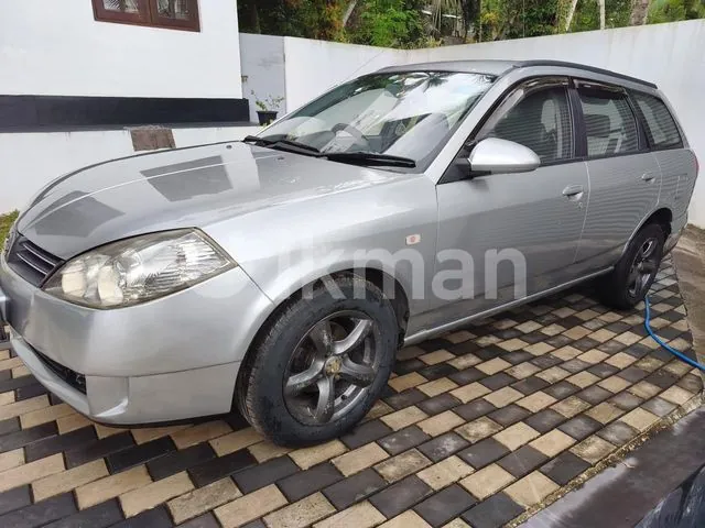 Nissan Wingroad 2003 photo 2