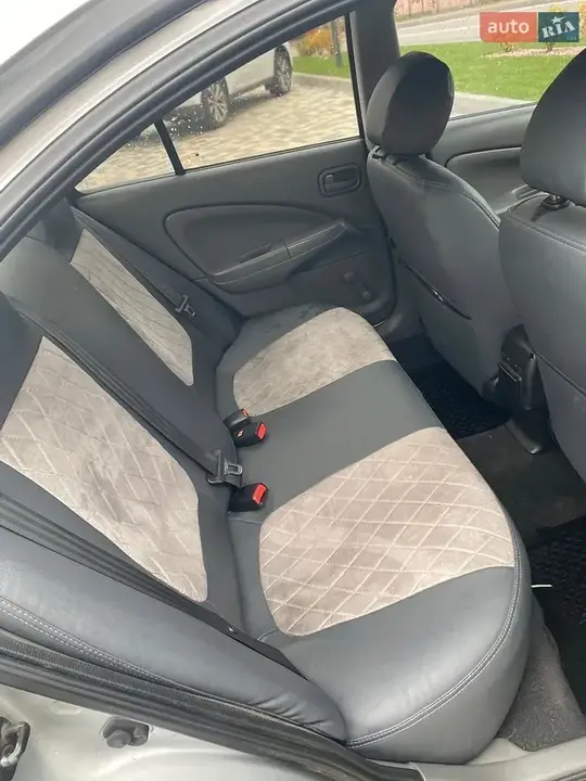 Nissan Almera 2012 photo 5