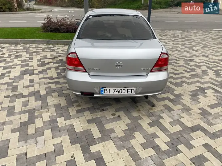Nissan Almera 2012 photo 4