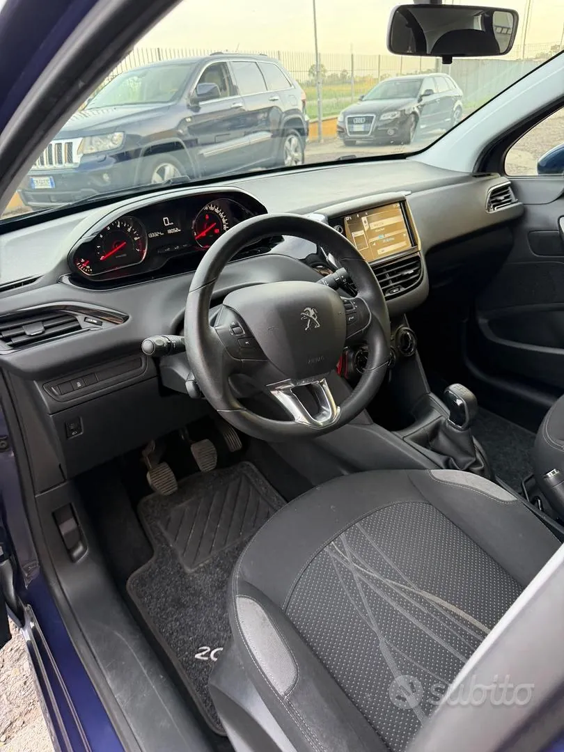 Peugeot 208 2013 photo 4
