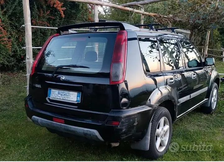 Nissan X-Trail 2003 photo 2