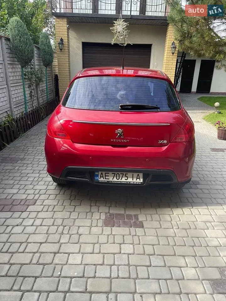 Peugeot 308 2011 photo 4