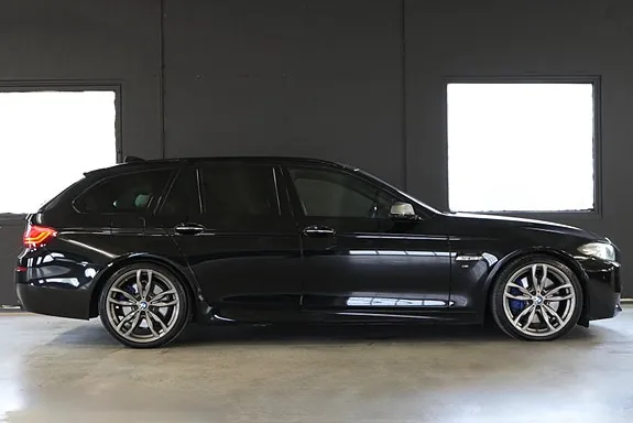 BMW M550D 2014 photo 4